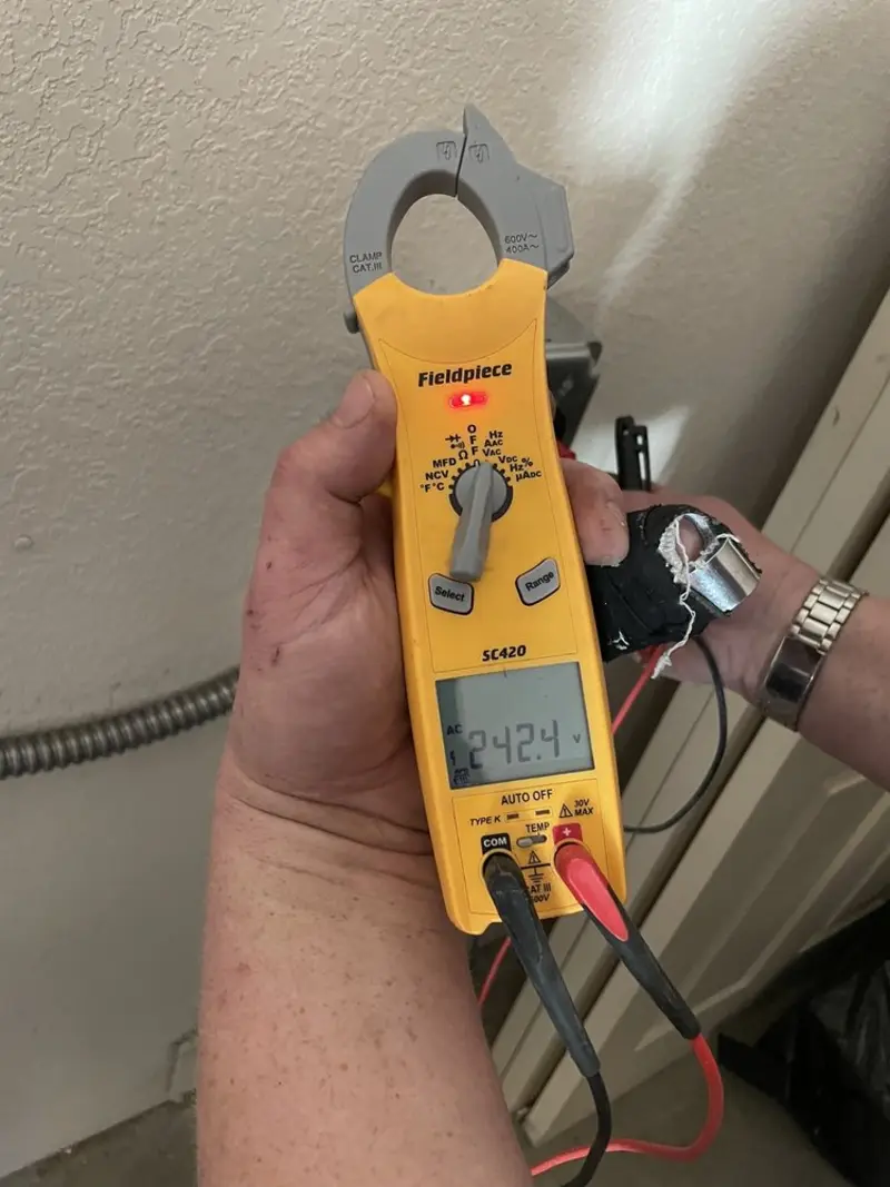 Voltage testing with clamp meter during Hot Tub / Pool Electrical Wiring in Huntertown